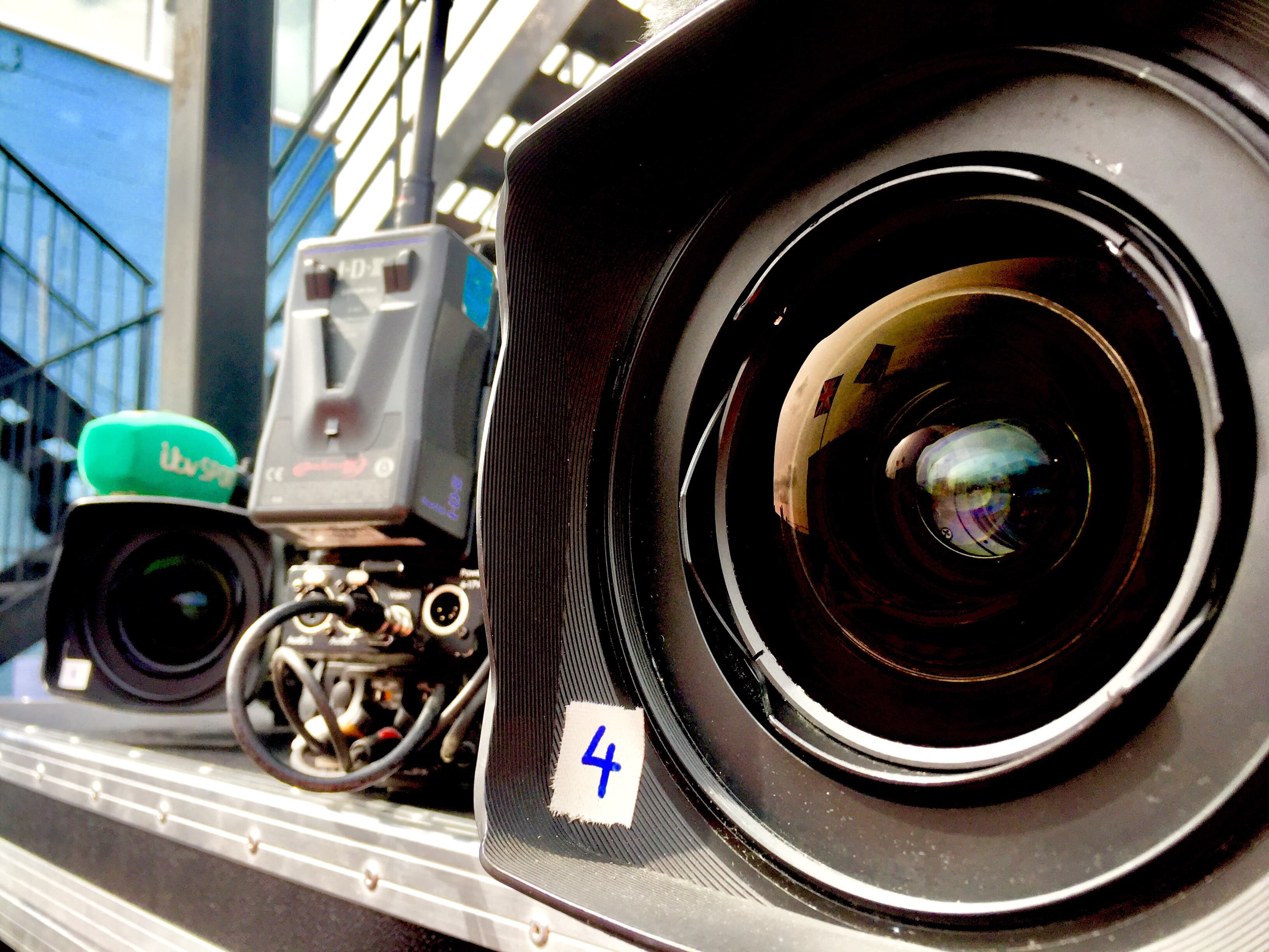 Cameraman filming motorsport